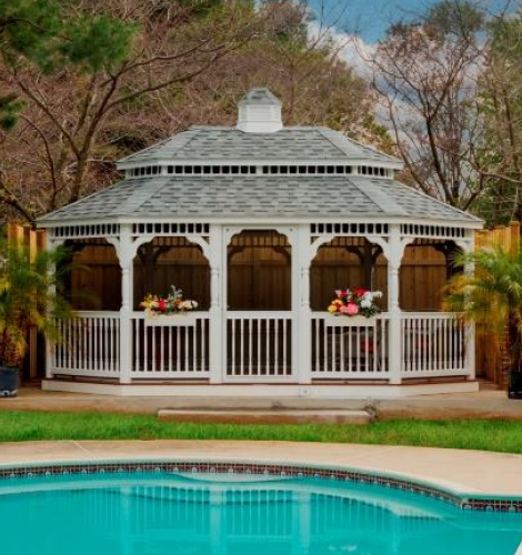 white octagon gazebo near a pool