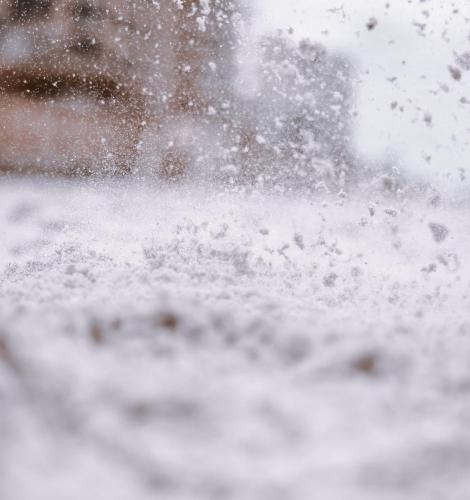 Closeup of snow falling on ground during a blizzard