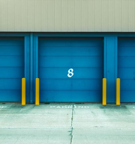 3 large blue storage units numbered 9, 8, 7