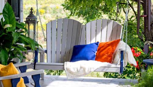 Hanging outdoor swing on porch