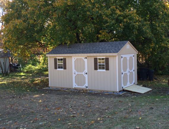 tan cottage sed with ramp