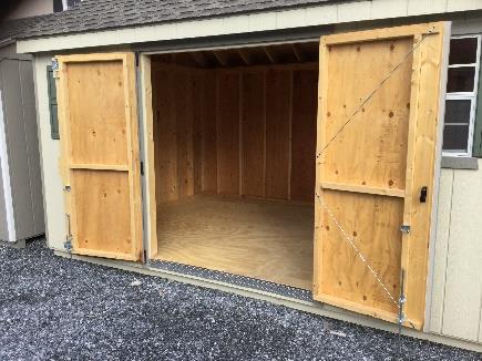 Space Makers Shed with double doors open to reveal the shed interior.