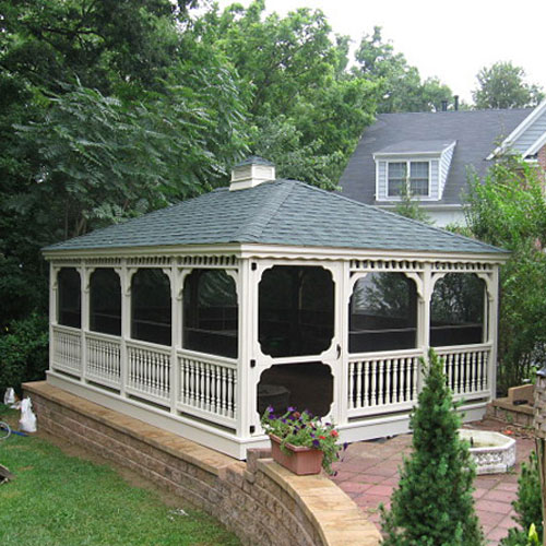 White vinyl rectangle gazebo with cupola in residential area